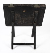 An antique folio stand, black lacquered finish and pictorial vignette, 19th century, 103cm high, 81cm wide. - 4