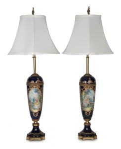 A pair of vintage French porcelain table lamps with hand-painted romantic scene vignettes in gilt metal mounts with later shades, 20th century, 90cm high overall
