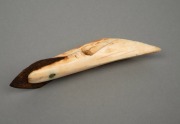 An Inuit harpoon tip, carved walrus tooth and steel, 13cm long. - 2