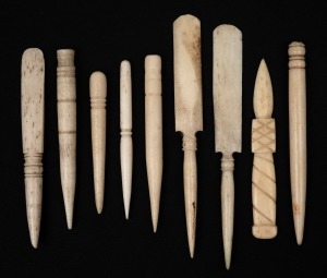 Nine assorted antique turned whalebone bodkins and implements, 19th century, the largest 10cm long.