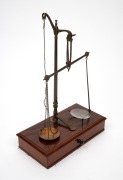 Antique gold scales on a single drawer mahogany base with ebony knob, 19th century, 37cm high, 25cm wide, 13cm deep. - 2