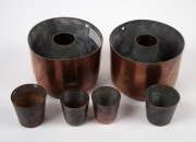 A pair of antique copper pudding moulds together with four assorted copper dariole moulds, 19th/20th century, (6 items), the largest 190cm high, 14.5cm diameter. - 2