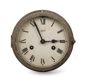SCHATZ German brass cased maritime bulkhead clock with time and strike movement, 20th century, 18cm diameter.