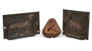 Three assorted antique and vintage chocolate moulds, 19th and mid 20th century, ​​​​​​​the largest 17cm high.