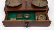 Antique gold scales on mahogany single drawer base, with cup weights and assorted weights, 19th century, ​​​​​​​48cm high, 35cm wide, 19cm deep. - 2