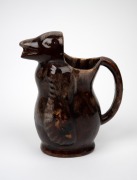 A brown glazed pottery bear wine jug, unknown age and origin, ​​​​​​​21.5cm high. - 2