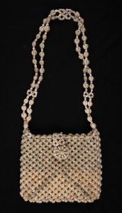 A vintage Australian shellwork handbag, circa 1950s, 51cm high including strap, 22cm wide.