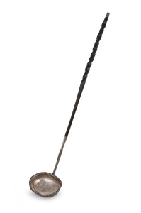 A Georgian silver toddy ladle with twisted baleen handle, 18th century, 36cm long.