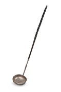 A Georgian silver toddy ladle with twisted baleen handle, 18th century, 36cm long.