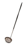 A Georgian silver toddy ladle with baleen handle, 18th century, 34cm long.