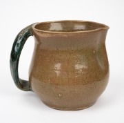 MERRIC BOYD green glazed pottery jug decorated with applied grapes and leaves, incised "Merric Boyd, 1935", ​​​​​​​15cm high, 18cm wide. - 3