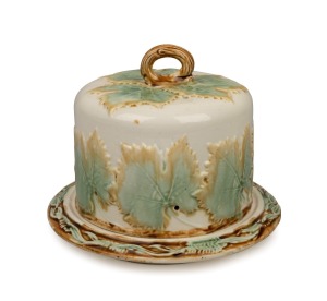 BENDIGO POTTERY antique cheese dish and cover with grape leaves and fern decoration, 20cm high, 25cm diameter. PROVENANCE: Private collection, Melbourne, purchased from Danuta Rogowski in Melbourne.