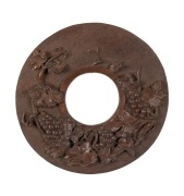 An antique jarrah folk art circular picture frame with carved grape decoration, Western Australian origin, 19th/20th century, 39cm diameter, (internal 14cm diameter).