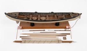 A model whale boat, 20th century, 54cm long.