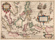JODOCUS HONDIUS (1563-1612), [ASIA] "INSULAE INDIAE ORIENTALIS praecipuae, in quibus Moluccae celeberrimae sunt", hand-coloured copper engraving, circa 1625, printed in Amsterdam with decorative cartouches, a ship battle and compass roses, plate size 34.5