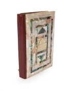 The KORAN, edition published in Cairo, with ornate mother of pearl boards, 20th century.
