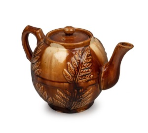 BENDIGO pottery teapot with fern decoration, 15cm high, 23cm wide.