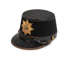 Convict period police kepi with officer's badge, buttons and Queen Victoria crown decoration, 19th century.