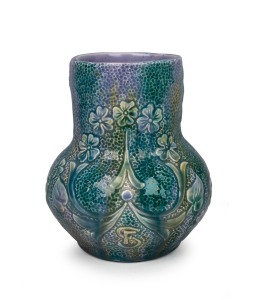 HARVEY SCHOOL mauve and green glazed pottery vase with floral decoration with monogram and date "F.S. 1925", incised "F. Stewart, Ipswich, 1925", 18cm high.