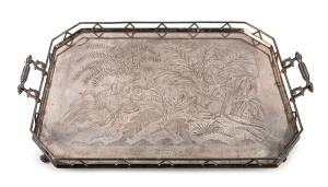 An antique English Aesthetic Movement silver plated serving tray decorated with kangaroo and emu in forest foliage, 19th century, 68cm across the handles.