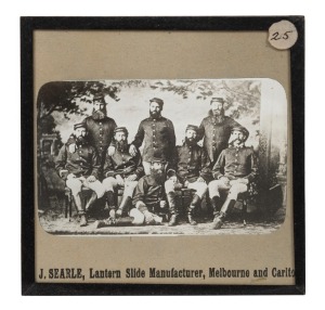 [THE KELLY GANG] Original glass magic lantern slide of the Victorian police involved in the pursuit and capture of Ned Kelly and his Gang including Hare and Steele; the slide maker is J. Searle of Melbourne; 1890s, 82 x 82mm.