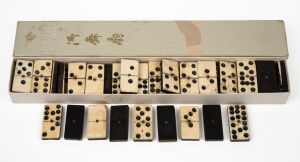 Assorted antique whalebone and timber domino tiles, an unusually large set, 19th century, each tile 4cm high.