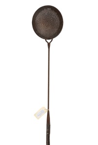 An antique trypot skimmer, iron with natural timber branch handle, 19th/20th century, 222cm overall.