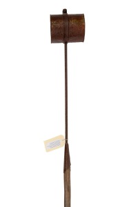 An antique trypot baler, iron and tin on wooden shaft, most likely from the Eden whaling station, New South Wales, early 20th century, 230cm overall.