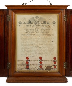 An antique Australian cedar two door wall mounted cabinet displaying a Masonic certificate, 19th century, 84cm high, 69cm wide, 12cm deep.