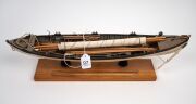 A model whale boat, 20th century, 54cm long. - 2