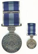 Group of un-named medals with Queensland and Northern Territory Police Service medals with bars & miniatures, Aboriginal Community Justice Panels 10 Year Service and International Force East Timor medals, all cased: Similar group x10 as singles; Un-named