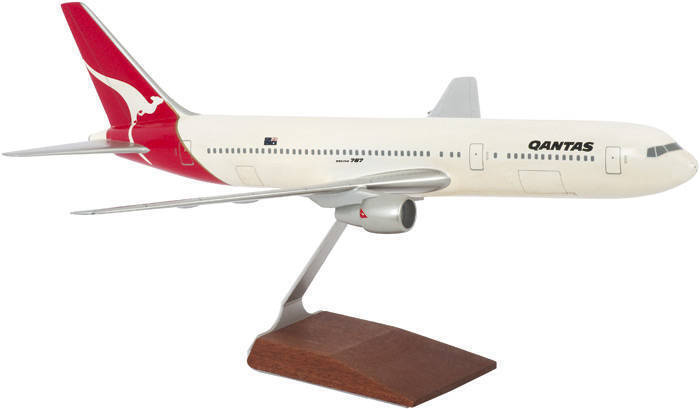AVIATION: QANTAS Boeing 767-300, circa 1/100 scale, length 56cm, 48cm wingspan. Together with two framed aviation prints.
