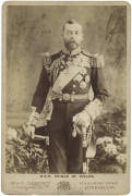 KING GEORGE V (1865-1936), cabinet card photograph (11x16cm), titled "H.R.H. Prince of Wales", taken by W&D Downey, Photographers to His Majesty The King, signed "George P" and dated 1902.
