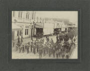 Victorian Rangers and Band High Street, Maryborough, c.1890s silver gelatin photograph, titled in negative lower left, signed "D.F.Plucki, Maryborough" in ink on backing below image, laid down on original backing, 11x15cm.