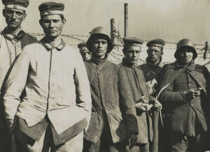 "TYPICAL HUN TYPES. Captured on the 4th by the Australians", c.1914-1918 silver gelatin photograph, titled in pencil in an unknown hand, with stamp verso, 11.2x15.7cm. Stamp reads "Australian official photograph, copyright".