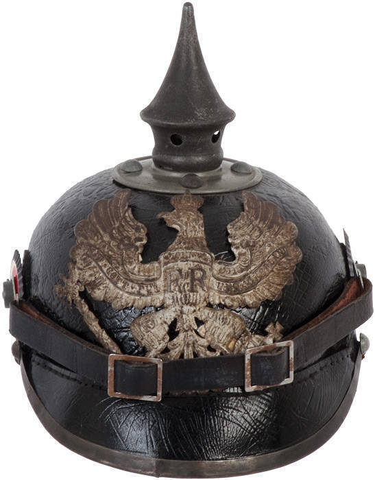 WW1 PRUSSIAN HELMET: original First World War Prussian boiled leather picklehaube helmet. Standard issue ear rosettes and leather chin strap. Original eagle helmet plate that reads "MIT GOTT F.FUERST. U. VATERLAND" (Prince with God and Homeland). Rare ite