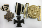 WW2 GERMAN METAL INSIGNIA: Assortment of Third Reich badges, medals, pins, belt buckles and buttons. Good condition.(18 items)