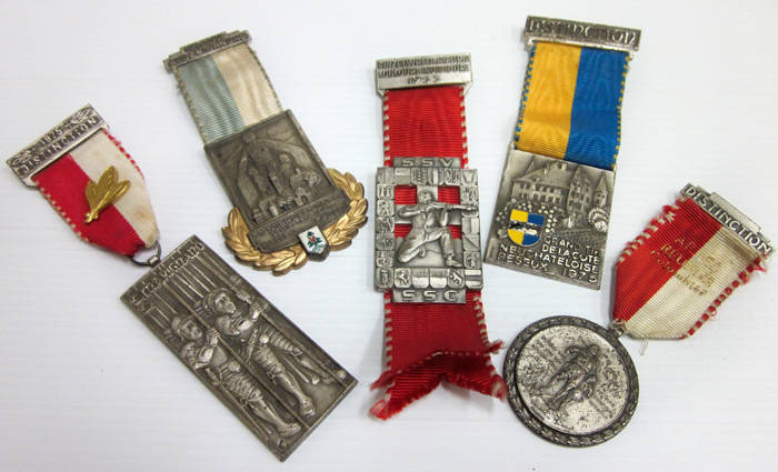 SWISS/AUSTRIAN MILITARY MEDALS: original medal assortment by Paul Kramer of Neuchâtel and Huguenin. Medals awarded for military achievements such as shooting and archery, excellent condition.(17 items)