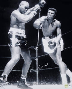 MUHAMMAD ALI, signed photograph from the Muhammad Ali vs Doug Jones fight, March 13th 1963, size 40x51cm. With 'Online Authentics' No.9611.