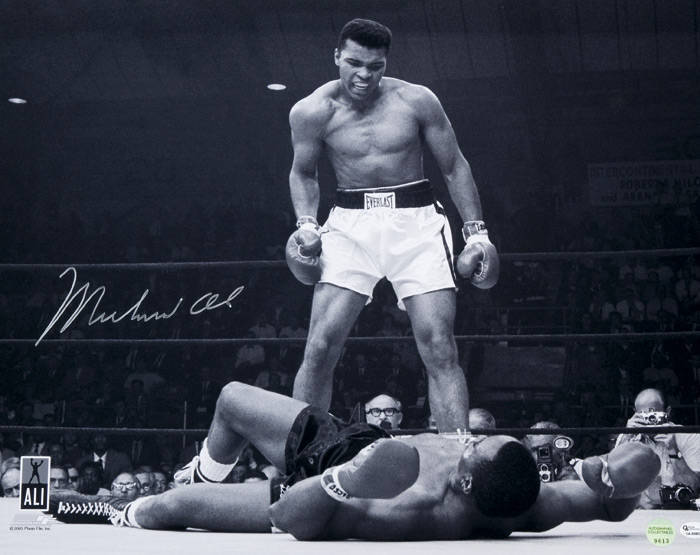 MUHAMMAD ALI signed b w photograph of Ali standing over Sonny