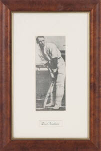 DON BRADMAN, display comprising nice signature on picture of the Don's batting stance, window mounted, framed & glazed, overall 32x47cm. With CoA.