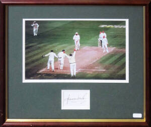 SHANE WARNE, display comprising signature on piece, window mounted with colour photograph of "Ball of the Century", framed & glazed, overall 46x43cm.