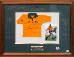 DAVID CAMPESE: Display "David Campese, 100th test, Padova, Italy, 23 October 1996", with signature on mini-jumper, window mounted with action photo, limited edition 7/500, framed & glazed, overall 62x48cm. With CoA.