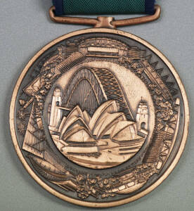 2000 PARALYMPICS BRONZE MEDAL, designed by Stuart Devlin, 70mm diameter, front featuring Opera House & Sydney Harbour Bridge, reverse featuring Paralympics logo. Presented to Sue-Ellen Lovett, Director of Sydney Paralympic Organising Committee, and a comp