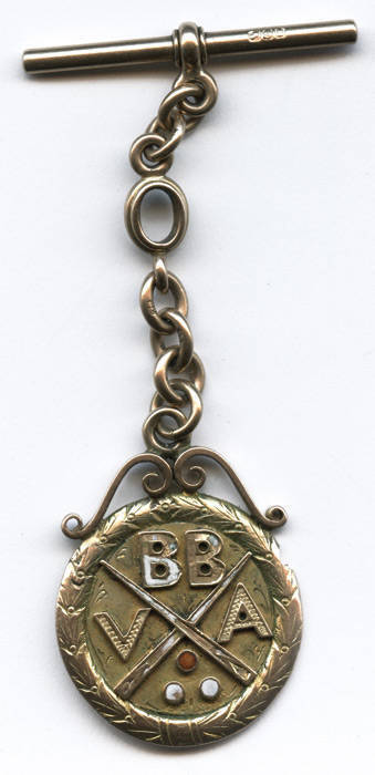 BILLIARDS MEDAL, 9ct gold & enamel fob/medal with Billiards cues, balls & "BBVA" on front, engraved on reverse "Presented by Victorian Bowlers Billiard Assn, Championship 1917-18, Won by T.W.Tyrer". Some enamel details missing from front. Weight 13.10 gra