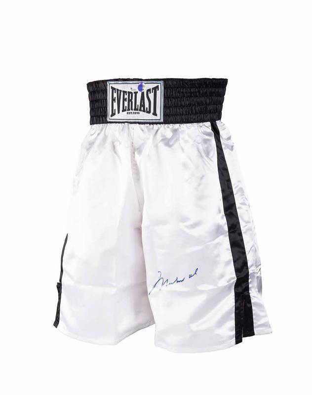 MUHAMMAD ALI, signature on pair of 'Everlast' boxing shorts with black band & trim. With 'Online Authentics' No. OA-8099014.