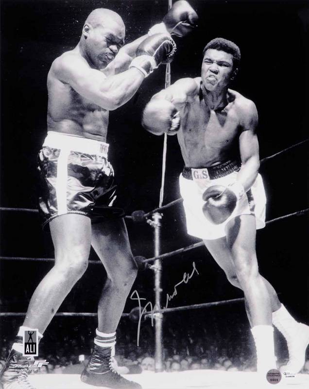 MUHAMMAD ALI, signed photograph from the Muhammad Ali vs Doug Jones fight, March 13th 1963, size 40x51cm. With 'Online Authentics' No.OA-8090288.