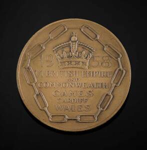 1958 BRITISH COMMONWEALTH GAMES IN CARDIFF, Participation Medal "1958 VI.British Empire and Commonwealth Games, Cardiff, Wales", 55mm diameter, engraved on rim "Robert Kotei". [Major General Robert Kotei (1935-79) was a soldier, politician and track and f