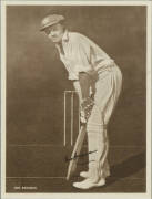 DON BRADMAN, signature on picture of the Don's batting stance c1928, window mounted, framed & glazed, overall 33x41cm.