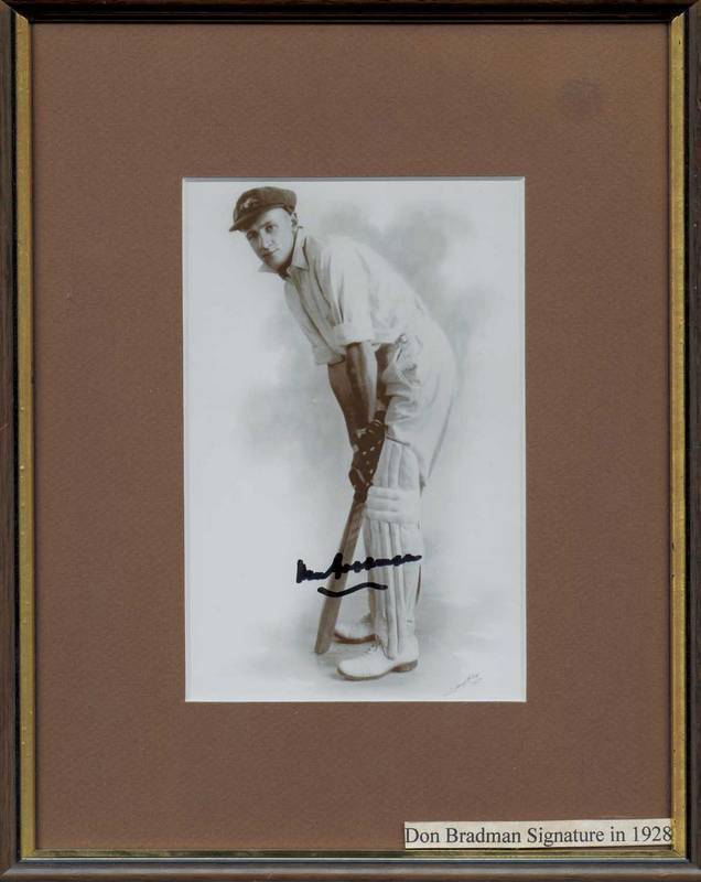 DON BRADMAN, signature on photo of the Don's batting stance in 1928 (framed, 23x28cm); plus 2004 Bradman Luncheon menu signed by Bradman's grand-daughter. (2 items).